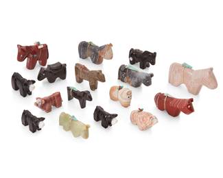 322
A group of Zuni carved stone and jet fetish figures
Mid/late 20th century
Some with label indicating artist; cows signed illegibly to interior legs
Comprising eleven carved horse figures, four carved cow figures, and a carved bear figure from various makers such as Emery Boone, Rodney Laiwakete, Melissa Quam, Julie Norton, and Virginia Toombs, some with turquoise inlaid eyes, one with inlaid heartlines, and ten with mounted offerings
16 pieces
Largest: 2.25" H x 3.5" W x 0.5" D; Smallest: 1" H x 2" W x 0.5" D
Estimate: $200 - $400