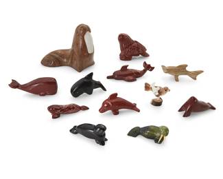 267
A group of Zuni & Inuit carved stone sea animal fetish figures
Mid/late 20th century
Seven variously labelled for or signed by the artist
Comprising a large Inuit carved brown stone walrus with white stone tusks, and a small Inuit carved stone seal and pup sculpture by Maurice Nattanguk (b.1954, King island, Alaska), as well as ten Zuni carved stone fetish sea animal figures including whales, seals, dolphins, a shark, a walrus, and a large eagle, all from various makers such as Louise Singer, A. Chavez, Chris Yuselew, Tracey Zunie, Elroy Pablito, and Adrian Cachini, most with turquoise inlaid features, and two with sgraffito designs
12 pieces
Largest: 3.625" H x 3.25" W x 4" D; Smallest: 1" H x 2.125" W x 1" D
Estimate: $200 - $400