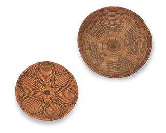 312
Two Apache baskets
Early 20th century; Southwest United States
Comprising a large coiled basketry bowl with radiating graduated checkerboard motifs (4.5" H x 12.75" Dia.), and a small coiled basketry tray with interlaced central floral star motif (1.75" H x 10" Dia.)
2 pieces
Estimate: $400 - $600