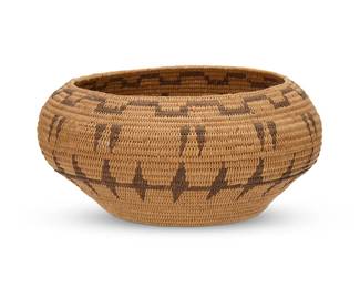 193
A Miwok basket
Early 20th century; Northern/Central California
A coiled globular footed bowl with a middle band of floating arrows, stepped and hatched bands to rim and waist, and delicate pointed motifs to base
4" H x 8" Dia.
Estimate: $600 - $900