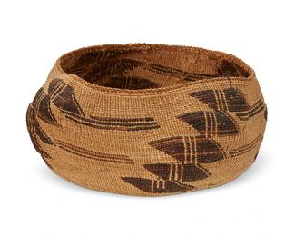 157
A polychrome Pit River basket
Early/mid-20th century; Northeast California
A low twined basketry bowl with diagonally stacked columns of geometric overlay motifs and floating striped bands
4.75" H x 9" Dia. approximately
Estimate: $400 - $600
