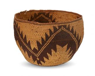 156
A polychrome Pit River basket
Early 20th century; Northeast California
A tall twined basketry bowl with sawtooth zigzag banding
6.75" H x 9" Dia. approximately
Estimate: $400 - $600