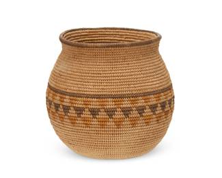118
A polychrome Chemehuevi basketry olla
Early 20th century; Great Basin/Southwest United States
A coiled globular jar with three stacked bands of triangles
4.75" H x 5.25" Dia.
Estimate: $700 - $900