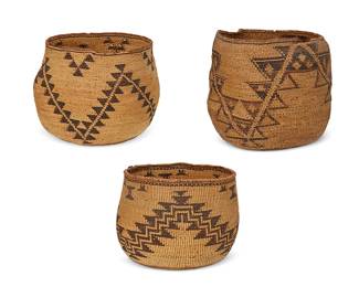 161
A group of large Pit River baskets
Early/mid-20th century; Northeast California
Comprising three twined polychrome tall basketry bowls, each with zigzag triangle banding and floating triangular and sawtooth elements, the smallest with coiled rim
3 pieces
Largest: 8" H x 9.5" Dia. approximately; Smallest: 6" H x 8.5" Dia. approximately
Estimate: $600 - $900