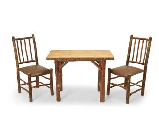72
An Old Hickory-style table and pair of side chairs
Late 20th century
Each unmarked
Comprising a small table, the top with bark edges, raised on natural wood legs, together with a pair of conforming side chairs, each with spindle back above a leather upholstered seat cushion
3 pieces
Table: 30" H x 41.5" W x 23.5" D; Each chair: 40.5" H x 18.5" W x 25.5" D approximately
Estimate: $500 - $700