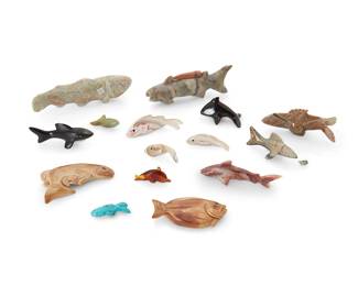 265
A group of Zuni carved stone fish fetish figures
Mid/late 20th century
Eight variously signed by the artist; two with unknown initials: DTY / RI
Comprising fifteen fish, shark, and orca killer whale figures in various stones, shells, tagua nut, and amber, from various makers such as Louise Singer, E. Bowekaty, Herbert Him, Kenny Chavez, Calvert Bowannie and others, some with turquoise inlaid features, and one mounted with offerings
15 pieces
Largest: 1.25" H x 4.5" W x 0.625" D; Smallest: 1.625" H x 1.25" W x 0.25" D
Estimate: $200 - $400