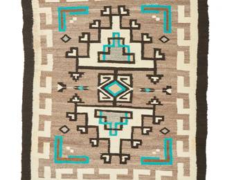 213
A Navajo regional rug
Mid-20th century, Diné
A fine weave textile woven in gray, black, cream, tan, and turquoise blue with a separated central stepped diamond, with floating arrows and hooked borders
42" H x 31.5" W
Estimate: $300 - $500