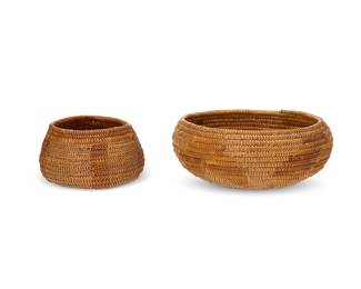 13
Two small polychrome California Mission baskets
Early 20th century; Southern California
Two diminutive coiled globular low bowls, each with contrasting floral motifs
Larger: 2" H x 5: Dia.; Smaller: 1.875" H x 3.25" Dia.
Estimate: $300 - $500