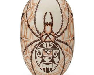29
Burel Naha (b. 1944, Hopi-Tewa)
A Hopi polychrome pottery seed pot, late 20th/21st century
Signed to base with artist's katsina and feather marks
An elongated seed pot with spider and web motif, with katsina medallions and arrow/thorn accent banding to sides
7.75" H x 4.5" Dia.
Estimate: $600 - $800