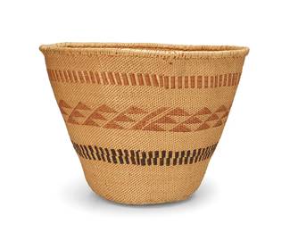 192
A polychrome Washoe burden basket
20th century; Northeastern California/Nevada
A large twined tapered flat base basket with bands of ticking either side of a band of diagonal triangular motifs
13" H x 17" Dia.
Estimate: $700 - $900