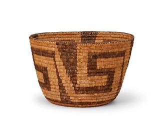 337
A large Pima basketry bowl
Early 20th century, Akimel O'odham; Southwest United States
The tall coiled flared basket with overall stepped motif banding
7.25" H x 11.5" Dia.
Estimate: $300 - $500