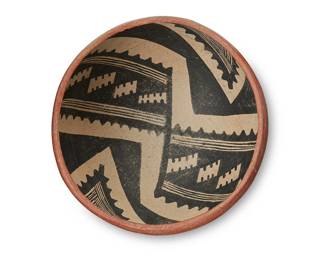 30
A Gila polychrome pottery bowl
Prehistoric
The three-color pot with black on white geometric motifs to interior
5.125" H x 9.25" Dia.
Estimate: $600 - $900