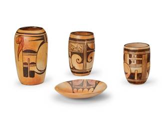 251
A group of Hopi Pueblo pottery vessels
Mid-20th century; Arizona and Southwestern United States
Each unmarked
Comprising three cylindrical pottery jars, each with polychrome or black line avian motifs and a small pottery tray/plate with polychrome avian motif to center
4 pieces
Largest jar: 7.25" H x 4.25" Dia.; Smallest: 4.875" H x 3.375" Dia.; Tray: 1.25" H x 6.25" Dia.
Estimate: $500 - $700
