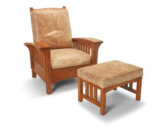 277
An Arts & Crafts bow arm Morris chair
Late 20th century
Each unmarked
The wood Arts & Crafts/ Mission-style reclining chair with ladder seat back reclining at four angles, each set with wood pegs verso, featuring mortise and tenon construction and curved arms raised on corbeled supports and six slats to each side, the seat and seatback cushions upholstered in brown leather, together with a conforming ottoman
2 pieces
Chair: 41" H x 34" W x 40" D; Ottoman: 16.25" H x 25.25" W x 18.5" D
Estimate: $600 - $800
