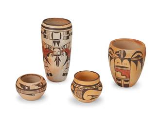 253
A group of Hopi polychrome pottery vessels
Mid-20th century
One with pictorial cipher to underside; three with partially legible penciled attributions
The yellowware group comprising two three-color tall jars, each with avian motifs to body, a seed pot with banded stepped motifs, and a smaller jar with banded geometric motifs
4 pieces
Tallest jar: 8.75" H x 4.25" Dia.; Seed pot: 2.875" H x 4.25" Dia.
Estimate: $200 - $400