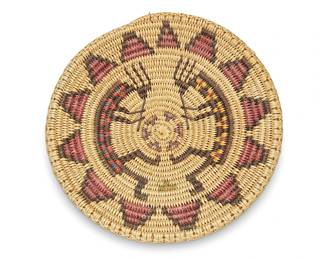 344
Peggy Rock Black (b. 20th century, Diné)
A polychrome Navajo pictorial basketry tray
Late 20th/21st century
A coiled low tray with two Kokopelli figures and sunburst stepped motifs to edge
2" H x 11.5" Dia.
Estimate: $200 - $400