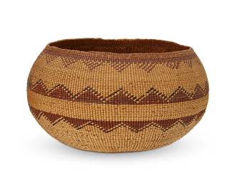 34
A polychrome Hupa/Yurok/Karuk basketry bowl
Early 20th century; Northern California
A low bowl with a double band of imbricated triangles
4.5" H x 8" Dia. approximately
Estimate: $400 - $600
