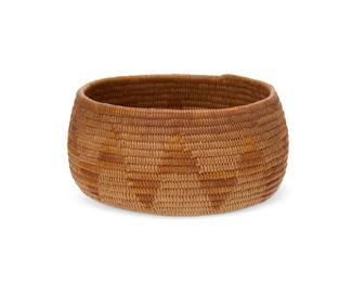 6
A small polychrome California Mission pictorial basket
Early 20th century; Southern California
A coiled low bowl featuring a Gila monster or rattlesnake motif to center and a band of alternating triangles to sides
2.5" H x 5" Dia.
Estimate: $500 - $700