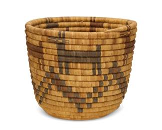 113
A polychrome Hopi pictorial basket
Early 20th century; Southwestern United States
A tall coiled cylinder basket with multiple dog figures with stitch overlay features around the rim and a stepped checkered zigzag band below
8.25" H x 10" Dia.
Estimate: $300 - $500