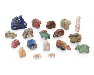 356
A group of Zuni & Navajo carved stone bear fetish figures
Mid/late 20th century
Four variously labeled for or signed by the artist
Comprising eighteen bear figures in various poses and stones including turquoise, sodalite, and mother of pearl, from various makers such as Herbert Davis (Navajo/Diné), Emory Eriacho, and Arnie and Claudia Calavaza, many with turquoise inlaid features, and five mounted with offerings
17 pieces
Largest: 2.375" H x 3" W x 1.75" D; Smallest: 0.5" H x 1.125" W x 0.5" D
Estimate: $200 - $400