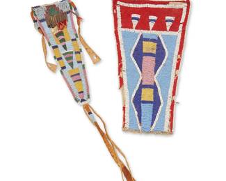 231
Two Crow beaded hide items
Late 19th/early 20th century, Apsáalooke; Northern Plains
Comprising a large triangular beaded hide panel or possible martingale, with geometric beaded motifs worked in blue, pink, yellow, and white on red wool, as well as a narrow beaded hide bag or sheath in pinks, blues, greens, and reds, with metal cone dangles and yarn fringing, with beaded hide straps and tassels
2 pieces
Largest: 11.25" H x 6.25" W; Smallest: 9.5" H x 3.25" W (tassel: 8" L)
Estimate: $800 - $1,200