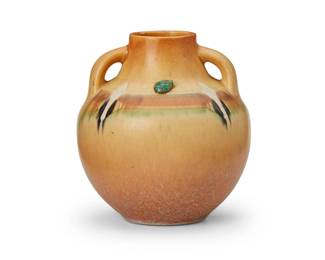 262
A Roseville pottery "Montacello" vase
1930s
Unmarked
The glazed terracotta vase, shape 526-7, with opposed lug handles and later applied turquoise accents
7.25" H x 6.625" Dia.
Estimate: $200 - $400