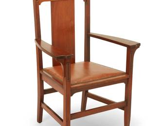 125
An Arts & Crafts armchair
Early/Mid-20th century
The wood chair with leather upholstered seat with brass tacking and corbeled armrests with beveled fronts, featuring inlaid accents to front-facing upper support terminuses, raised on four legs joined by opposed lateral and front medial stretchers
42.75" H x 28.25" W x 22.5" D
Estimate: $200 - $400