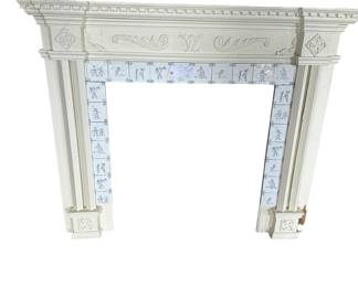 Detailed mantle with antique deflt blue tile surround