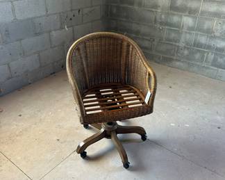 Wicker rolling desk chair. 22x23x34.5in