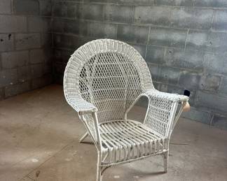 Vintage wicker occasional armchair.