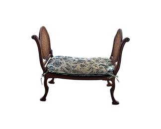 French style bench with cane sides.