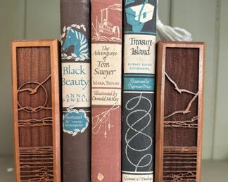 Beautiful bookends by Lasercraft. The three books are sold.