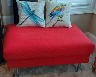 Red Ottoman with Pillows