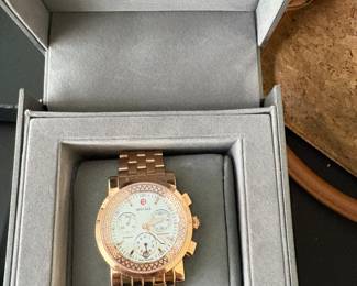 Michele Chronograph feature. 18k Rose Gold case and bracelet. 96 diamonds set on the bezel.