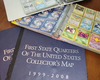 2 books of Pokemon cards