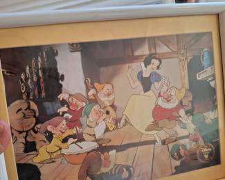 Lots of framed Disney prints