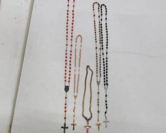 Assorted Catholic crucifix rosary necklaces