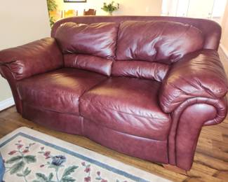 Burgundy leather loveseat