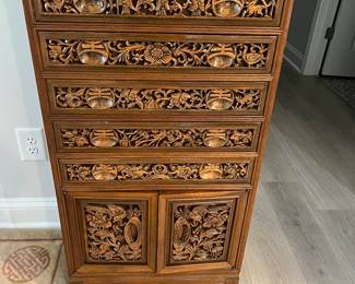 Carved chest for flatware and table linens