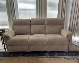 Three-seater reclining sofa