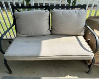 Outdoor metal couch with cushions