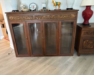 Carved detail and glass doors for top of china cabinet