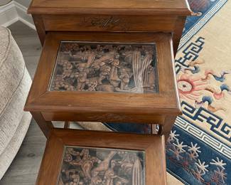 Set of carved nesting tables