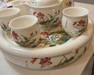 Tea including a tea pot with strainer, 6 cups and a 2-piece tea boat or tea tray