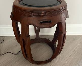 Pair of carved barrel side tables