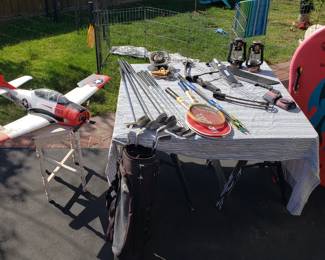 Golf Clubs, bag, Vintage Tennis Rackets, Compound Bow and Arrows Camping stove,