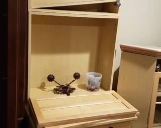 wall cabinets with natural maple doors and matching floor desk cabinets.