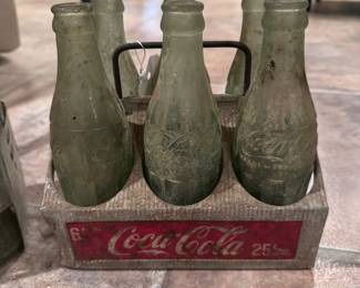 Coca-Cola bottle caddy and bottles