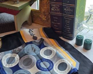 Coach scarf, upstairs bedroom left.