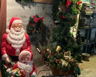 Two Santa blow molds